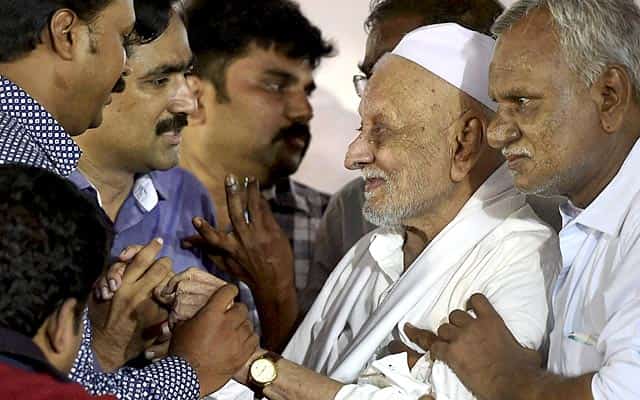 Former president Kalam's elder brother Mohammed Muthu Meera Lebbai Maraicker and adviser V Ponraj are seen after paying their last respects at the public view ground in Rameswaram on July 29, 2015. PTI Photo Former president Kalam's elder brother Mohammed Muthu Meera Lebbai Maraicker and adviser V Ponraj are seen after paying their last respects at the public view ground in Rameswaram on July 29, 2015. PTI Photo