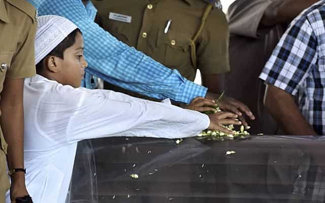 A boy pays his last respects to former president Kalam at the public view ground in Rameswaram on July 29, 2015. PTI Photo A boy pays his last respects to former president Kalam at the public view ground in Rameswaram on July 29, 2015. PTI Photo