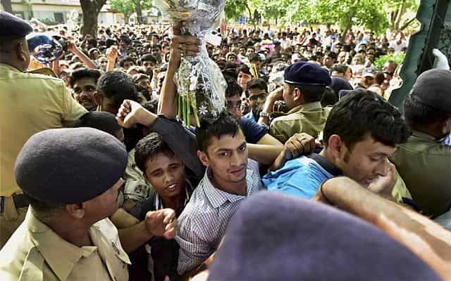 People throng outside Kalam's residence in New Delhi to pay their respects. PTI Photo People throng outside Kalam's residence in New Delhi to pay their respects. PTI Photo