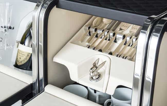 Passengers have a place for their cutlery and crockery and can keep their champagne chilled.. Photo:AFP