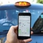 FILE PHOTO: A photo illustration shows the Uber app and a black cab in London, Britain June 26, 2018. REUTERS/Simon Dawson/Illustration (REUTERS)