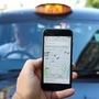 FILE PHOTO: A photo illustration shows the Uber app and a black cab in London, Britain June 26, 2018. REUTERS/Simon Dawson/Illustration (REUTERS)