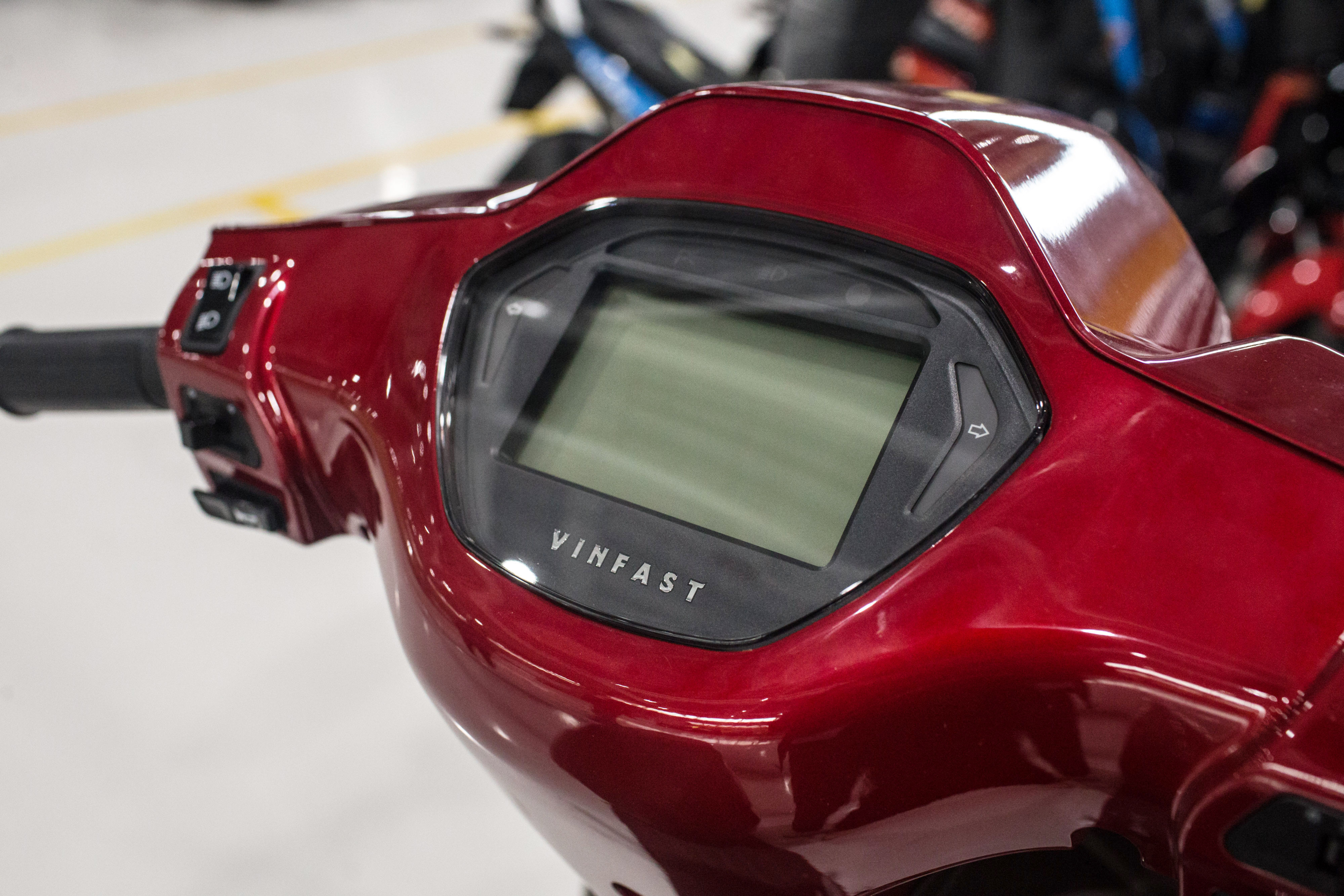The handlebars of a Vinfast Klara electric scooter. The handlebars of a Vinfast Klara electric scooter.