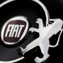 FILE PHOTO: Logos of Peugeot and Fiat