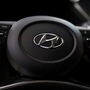 File Photo: The logo of Hyundai Motors is seen on a steering wheel of a all-new Sonata sedan.