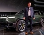 FILE PHOTO: R.J. Scaringe, Rivian's 35-year-old CEO, introduces his company's all-electric R1S SUV at Los Angeles Auto Show in Los Angeles, California, U.S. November 27, 2018. REUTERS/Mike Blake/File Photo