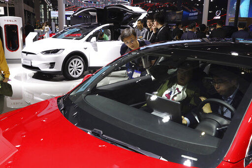 File photo of Tesla cars used for representational purpose. File photo of Tesla cars used for representational purpose.