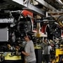 FILE PHOTO: Workers are seen on the production line at Nissan's car plant in Sunderland Britain, October 10, 2019. REUTERS/Phil Noble/File Photo