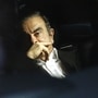 File photo of Carlos Ghosn, former chairman of Nissan Motor Co., center, sitting in a vehicle as he leaves his lawyer's office in Tokyo, Japan, on Wednesday, March 6, 2019. Photographer: Takaaki Iwabu/Bloomberg (Bloomberg)