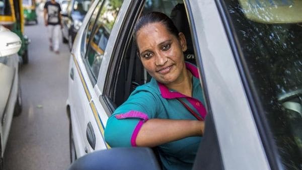 In this undated photo a woman chauffeur employed at Delhi-based Azad foundation's driving a car. Driven by financial need and sometimes to just look for fresh career opportunities the women are cutting through gender barriers to ensure they steer the course of their lives and also stay the course. (Photo | PTI)