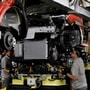FILE PHOTO: Workers are seen on the production line at Nissan's car plant in Sunderland Britain, October 10, 2019. REUTERS/Phil Noble/File Photo
