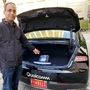 FILE PHOTO: Dheeraj Ahuja, Senior Director Of Engineering at Qualcomm, shows the new Snapdragon Ride autonomous driving computing system in the trunk of a demo car at the Consumer Electronics Show (CES) in Las Vegas, U.S., January 5, 2020. REUTERS/Jane Lanhee Lee