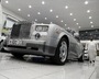 FILE PHOTO: A customer walks next to a Rolls Royce for sale at a second hand car showroom Classic Motors Showroom in Sanabis, west of Manama, Bahrain, April 11, 2019. Picture taken April 11, 2019. REUTERS/Hamad I Mohammed