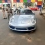 During a routine checking in Ahmedabad West. Porsche 911 was caught by PSI MB Virja. The vehicle had no number plate and valid documents. (Photo courtesy: @AhmedabadPolice)
