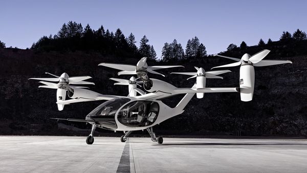 Joby Aviation's four-passenger aircraft takes off and lands vertically like a helicopter, then smoothly transitions to forward flight.