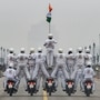 An all-woman bikers' team of CRPF 'Daredevils' motorcycle stunt team during the rehearsals for the upcoming Republic Day parade at Rajpath in New Delhi, Monday, Jan. 20, 2020. (PTI Photo/Kamal Singh) (PTI)