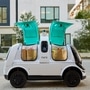 Nuro R2, a self-driving delivery vehicle, is shown with compartments ready for unloading in an undated photo in Houston, Texas, U.S. Nuro Inc/Handout via REUTERS. (via REUTERS)