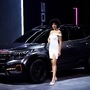 A model stands next to a Seltos X-Line concept launched by KIA Motors at the Auto Expo 2020 in Greater Noida on Thursday. (ANI)