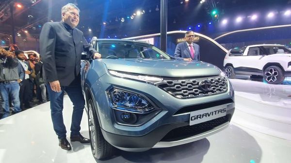 Guenter Karl Butschek poses with the new Gravitas launched by Tata Motors at Auto Expo 2020.