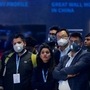Delegates wear face mask as they attend an event at the Auto Expo in Greater Noida, near New Delhi, India, Wednesday, Feb. 5, 2020. Indian organizers said they were unhappy over the cancellation of more than 296 Chinese delegates and exhibitors who skipped India’s biggest auto show due to the outbreak. Visitors at the event were greeted by signs warning against the disease, and many wore masks as they strolled around the exhibition in New Delhi. (AP Photo/Altaf Qadri) (AP)