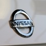 The Nissan Motor Co. badge is displayed on a GT-R Nismo vehicle displayed in a showroom at the company's headquarters in Yokohama, Japan, on Thursday, Feb. 13, 2020. Nissan cut its full-year profit outlook for the second time in as many quarters and scrapped its year-end dividend, renewing concern about the troubled automake's ability return cash to investors, especially top shareholder and partner Renault SA. Photographer: Akio Kon/Bloomberg (Bloomberg)