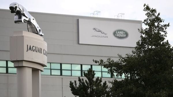 FILE PHOTO: Signs are seen outside the Jaguar Land Rover plant at Halewood in Liverpool, northern England, September 12 , 2016. REUTERS/Phil Noble/File Photo (REUTERS)