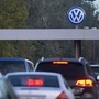 FILE PHOTO: Cars drive through the Sandkamp Gate to the Volkswagen factory in Wolfsburg, Germany. (REUTERS)