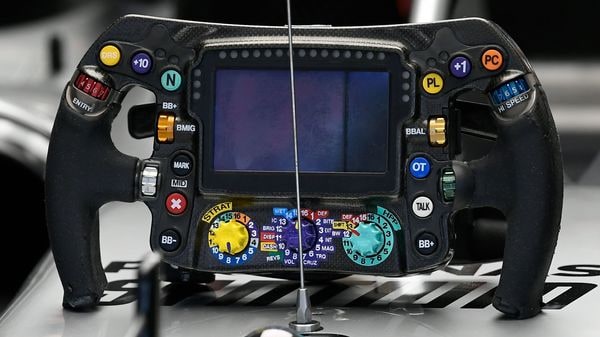Mercedes' British driver Lewis Hamilton's steering wheel is pictured on top of his car during the tests for the new Formula One Grand Prix season at the Circuit de Catalunya in Montmelo in the outskirts of Barcelona on February 19, 2020. (Photo by LLUIS GENE / AFP) (AFP)