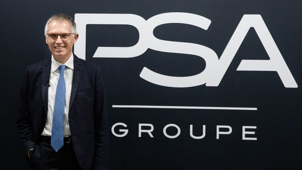 Carlos Tavares, chief executive officer of PSA Group, poses for a photograph during the automaker's full year earnings news conference in France. (Bloomberg)