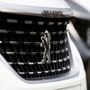 FILE PHOTO: The logo of French car manufacturer Peugeot is seen on a car at a dealership of the company in Selestat, France, January 14, 2019.   REUTERS/Vincent Kessler/File Photo  GLOBAL BUSINESS WEEK AHEAD (REUTERS)
