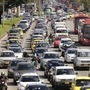 Cars and public buses are seen in a traffic jam along a main street ahead of local elections in Bogota. (REUTERS)