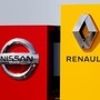 FILE PHOTO: The logos of car manufacturers Renault and Nissan are seen in front of dealerships of the companies in France. (REUTERS)