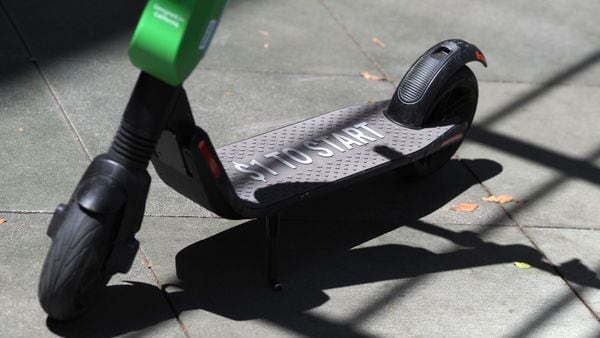 A Lime shared electric scooter is parked on a street in Santa Monica, California. (AFP)
