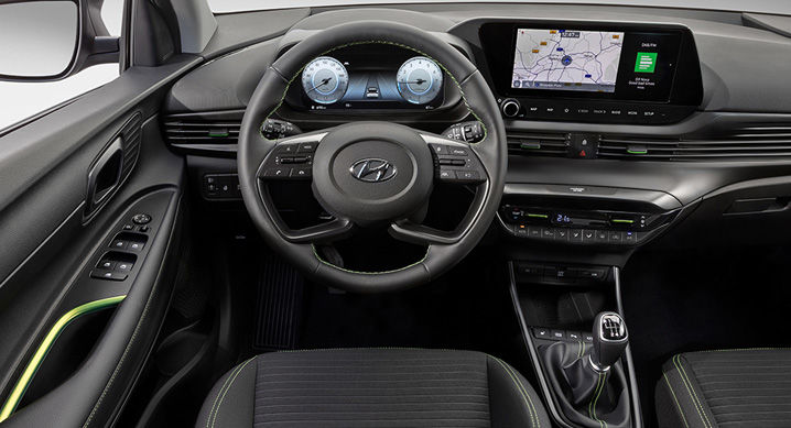 The redesigned steering wheel is equipped with four spokes