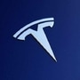 File photo: The front hood logo on a Tesla Model 3 electric vehicle. (REUTERS)