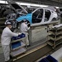 Workers assemble cars at the Dongfeng Honda Automobile Co., Ltd factory in Wuhan in central China's Hubei province. (AP)