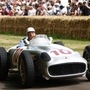 In this file photo taken on July 5, 2009 Britain's Stirling Moss drives his 1954 Mercedes Benz W196 racing car in England. (AFP)