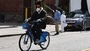 A man rides a Citi Bike past the Brooklyn Hospital in New York City. (AFP)