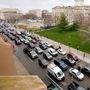 People in their vehicles protest against excessive quarantine orders from Michigan Governor Gretchen Whitmer around the Michigan State Capitol in Lansing, Michigan on April 15, 2020. (AFP)