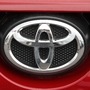 A Toyota Motor Corp. badge is seen on a vehicle at the Brent Brown Toyota dealership in Orem, Utah, U.S., on Monday, April 6, 2020. The coronavirus outbreak will reduce Japanese automakers' combined operating profit by 38% this fiscal year, but the manufacturers may rebound faster than they did after the global financial crisis more than a decade ago, analysts at Goldman Sachs Group Inc. said. Photographer: George Frey/Bloomberg (Bloomberg)