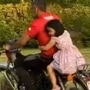 MS Dhoni riding bike with his daughter Ziva