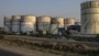 File photo: Oil storage tanks stand at Jawaharlal Nehru Port, operated by Jawaharlal Nehru Port Trust (JNPT), in Navi Mumbai, Maharashtra, India.  (Bloomberg)