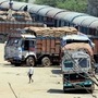 Workers unloading sacks from a goods train to the trucks to maintain the supply chain of the food and essential goods during the nationwide lockdown in Jharkhand.