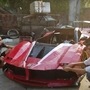 The carboard Ferrari runs on a motorcycle engine.