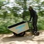 Kevin Nicks rides his motorised wheelbarrow, he hopes to set a new speed record and also hopes to raise people's spirits following the outbreak of the coronavirus disease. (REUTERS)