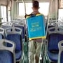 A Municipal personnel sanitizing a public transport bus during the lockdown. (ANI Photo)