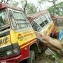 A bus damaged by a fallen tree due to Cyclone Amphan, is seen in Kolkata on Thursday (May 21). (via REUTERS)