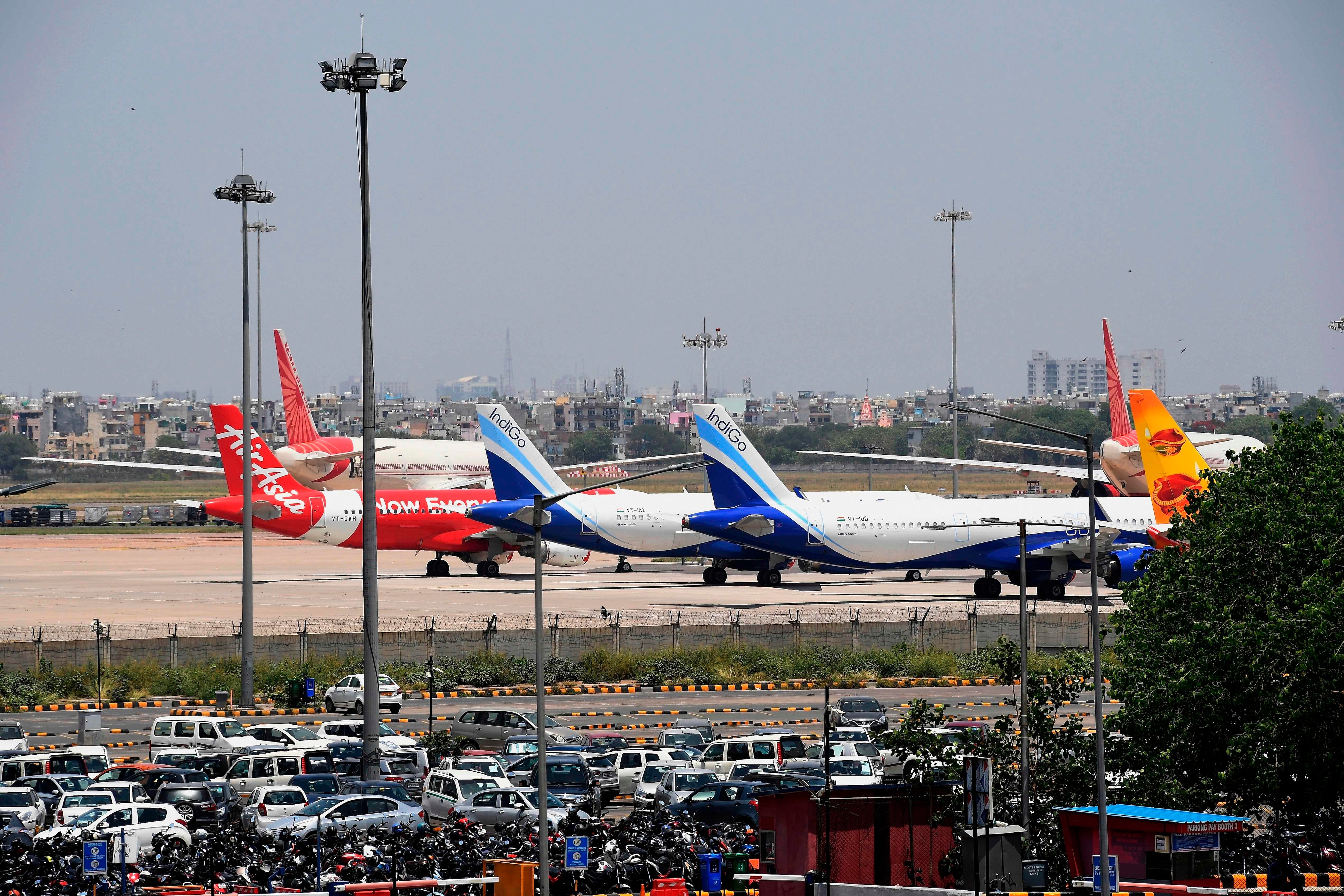 In this file photo taken on May 8, 2020 airplanes are seen at the Indira Gandhi International airport apron during a government-imposed nationwide lockdown.