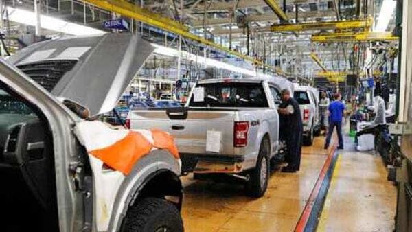 File photo: United Auto Workers assemblymen work on a 2018 Ford F-150 trucks being assembled at the Ford Rouge assembly plant in Dearborn. (AP) File photo: United Auto Workers assemblymen work on a 2018 Ford F-150 trucks being assembled at the Ford Rouge assembly plant in Dearborn. (AP)