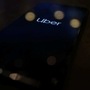 FILE PHOTO: The Uber logo is displayed on a mobile phone in this picture illustration. (REUTERS)